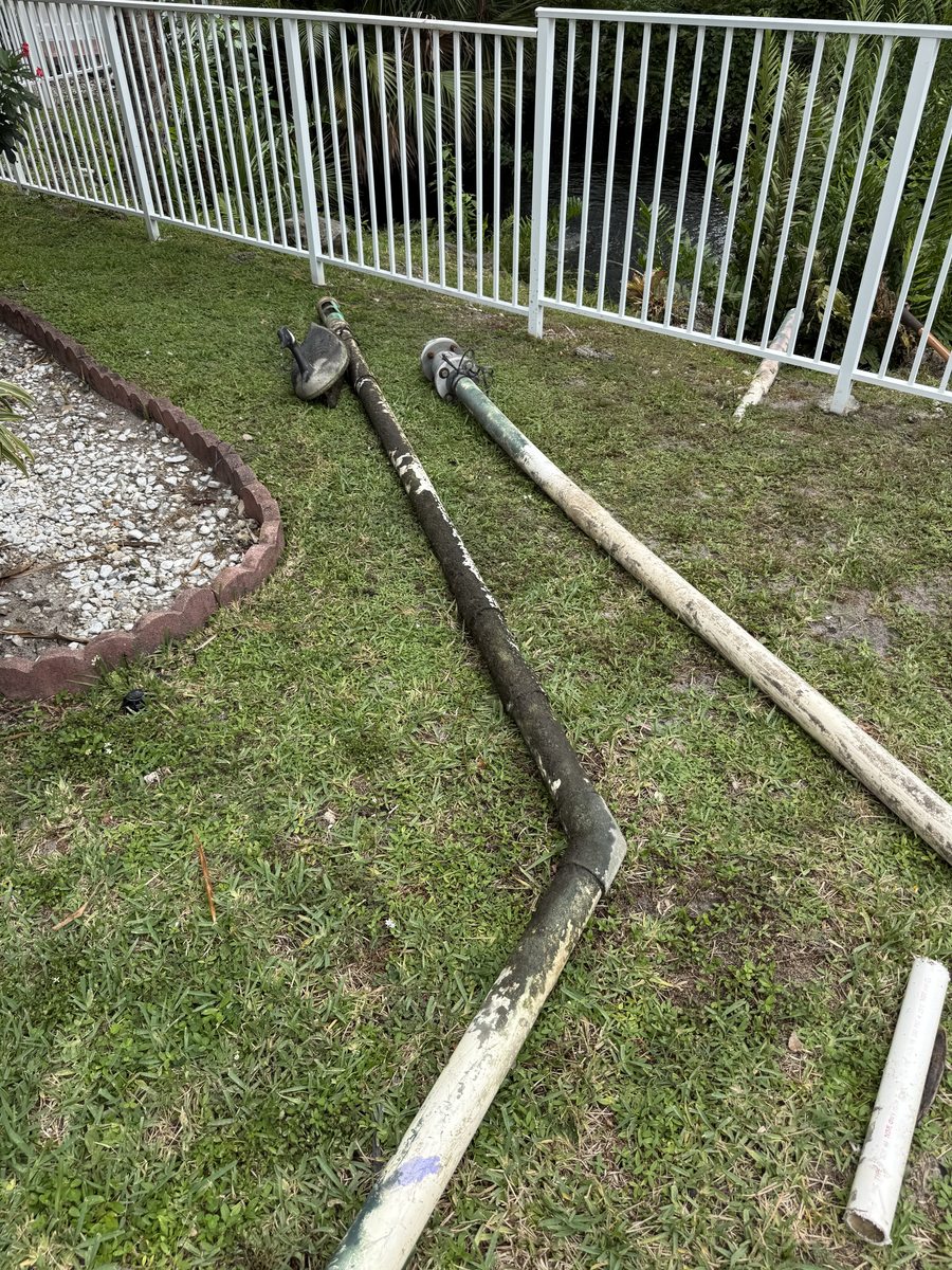 Before: severely corroded galvanized suction lines removed from irrigation pump system — Tamarac, FL HOA community