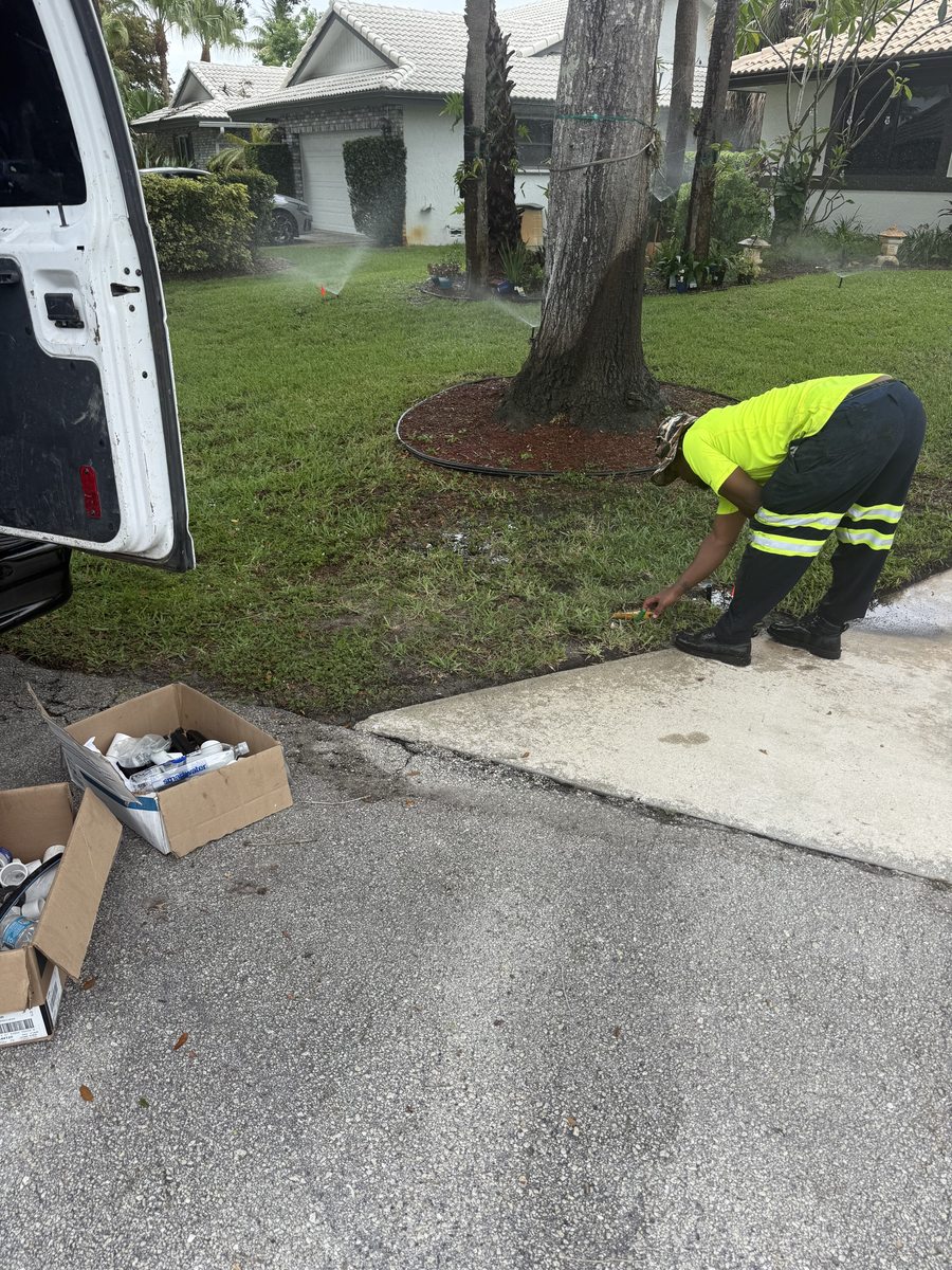 GroundLogic technician testing all irrigation zones after new well and system flush — Coral Springs, FL